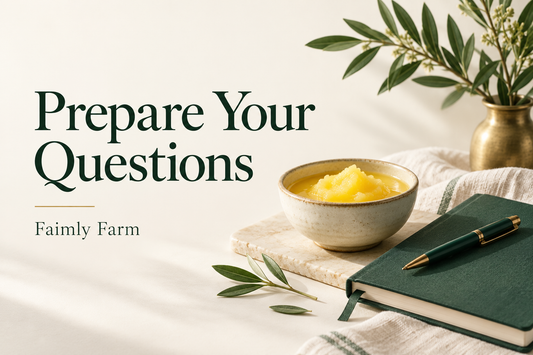 AI-generated illustration: small bowl of ghee beside a closed green notebook and pen, restrained food education editorial still life, no medical symbols. Faimly Farm editorial banner.